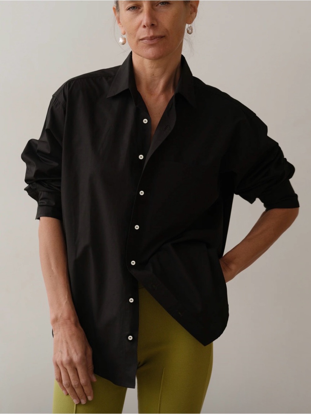 DONNI. Black button down pop shirt, M